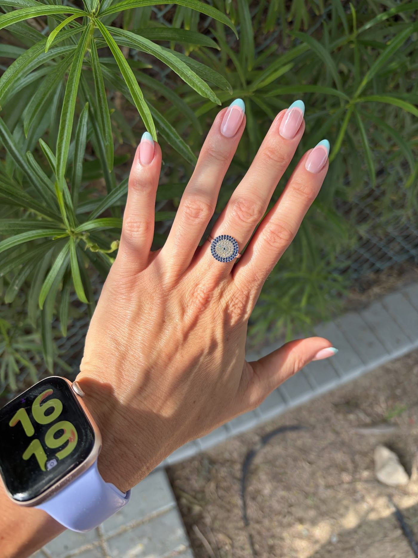 Almond nails with a soft blue French tip